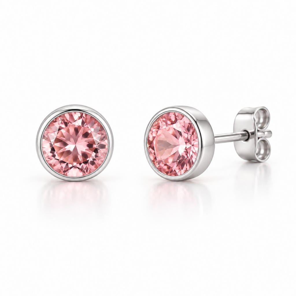 Aros Punto de Luz con Cristal Swarovski rosa y acabado color rodio sobre fondo blanco